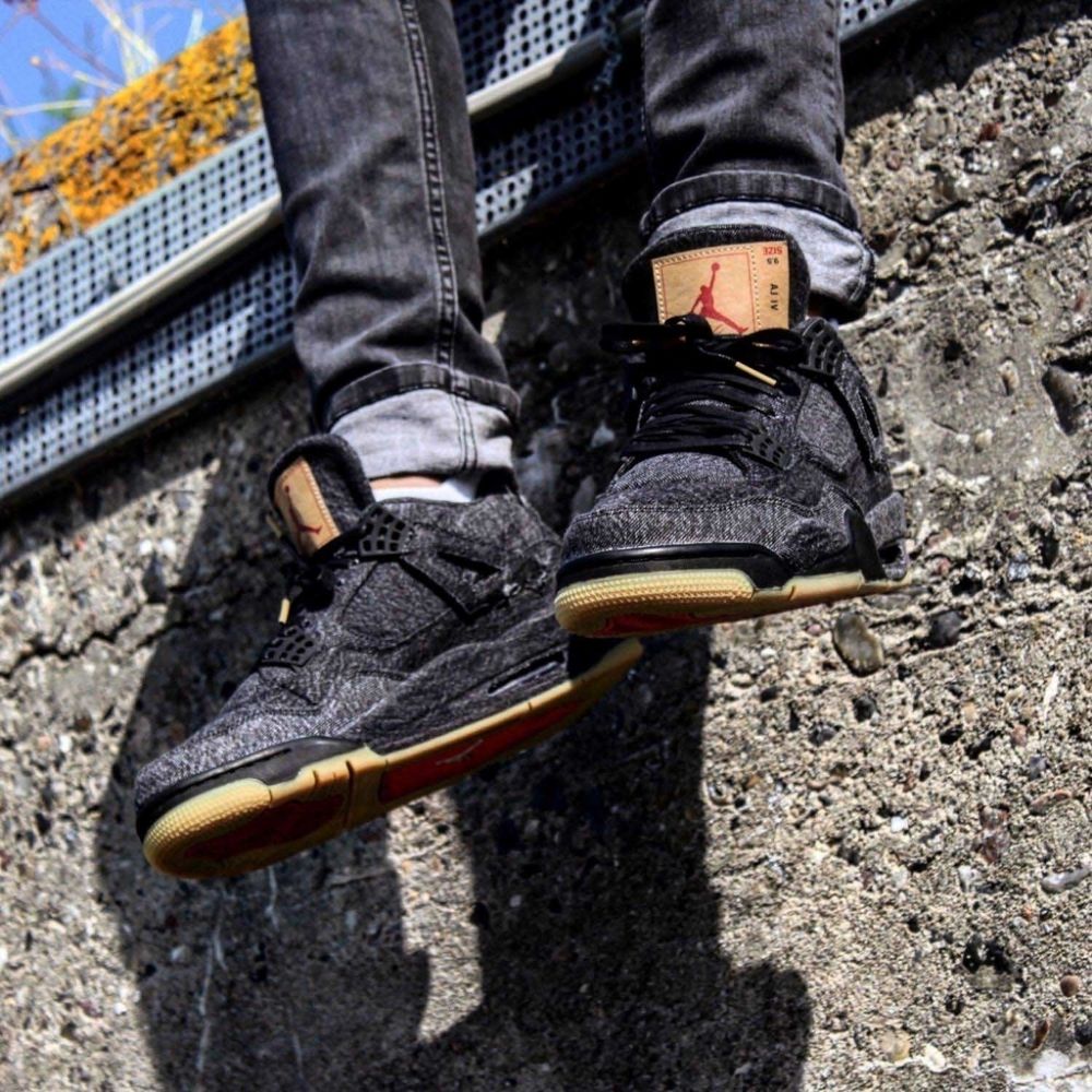 Air Jordan 4 Retro X Levis in Black Denim - product image from the listing.