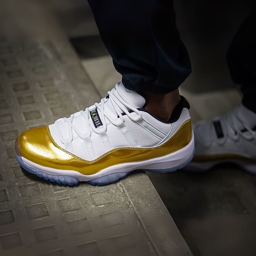 Air Jordan 11 Retro Low Closing Ceremony in White Metallic Gold - product image from the listing.
