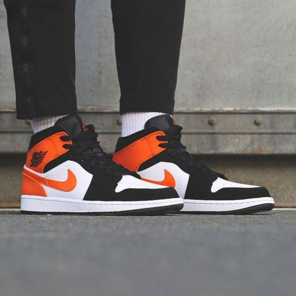 Air Jordan 1 Mid Shattered Backboard in Orange Black - product image from the listing.