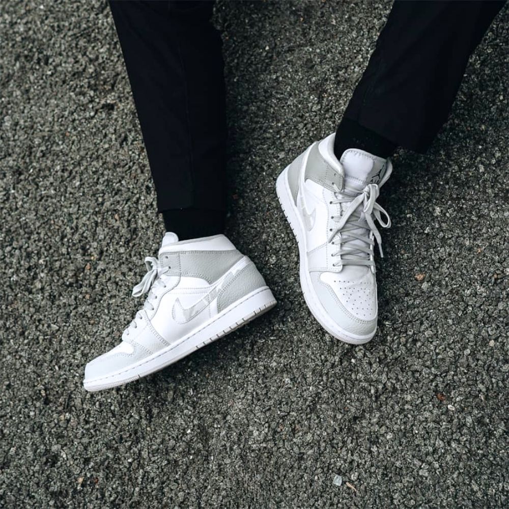 Air Jordan 1 Mid Swoosh Logo Grey Camo in White - product image from the listing.
