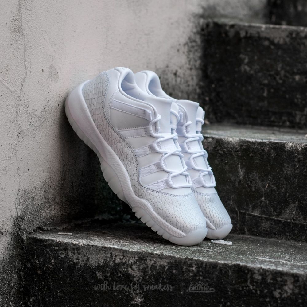 Air Jordan 11 Retro Low Heiress in Pure Platinum - product image from the listing.