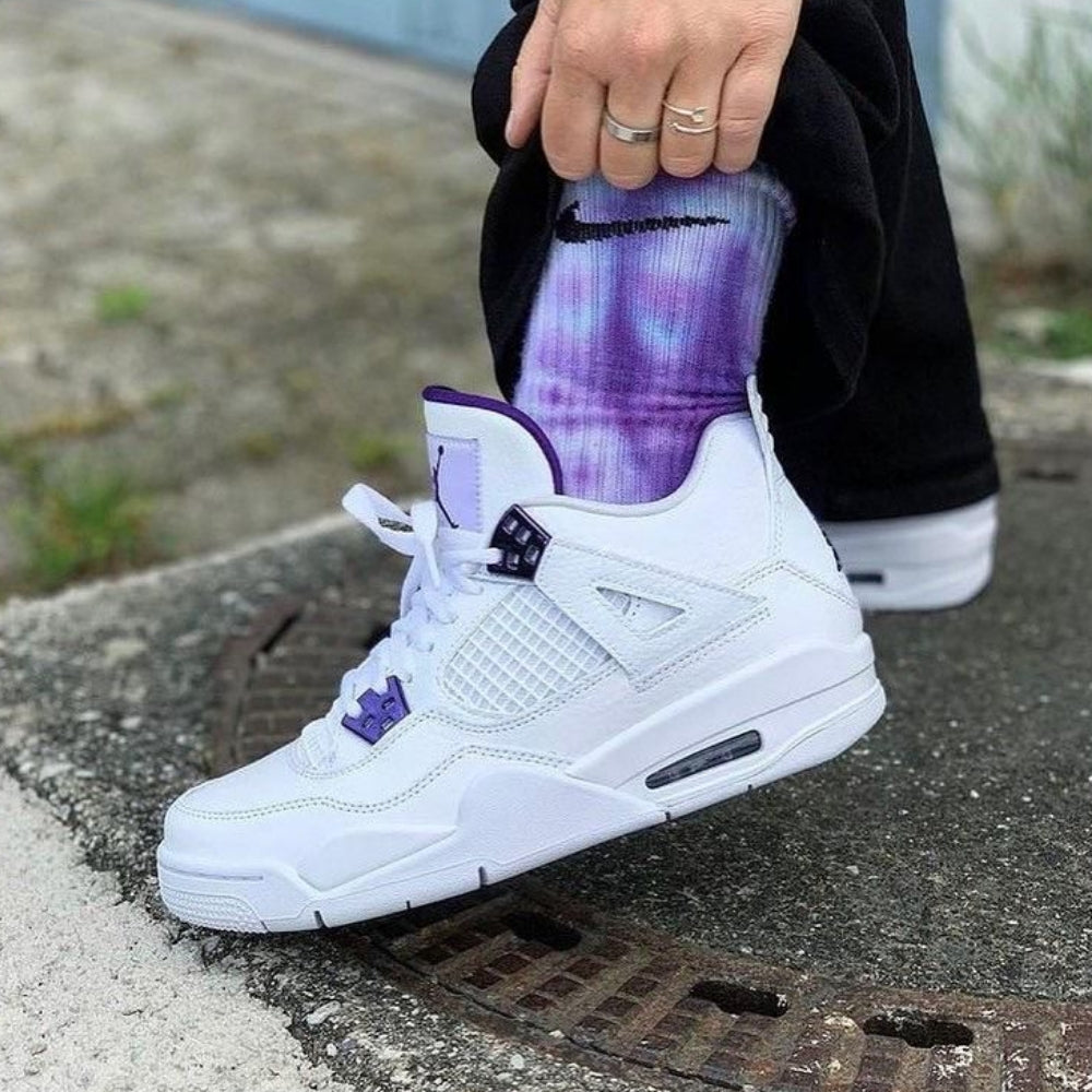 Air Jordan 4 Retro in Purple Metallic - product image from the listing.