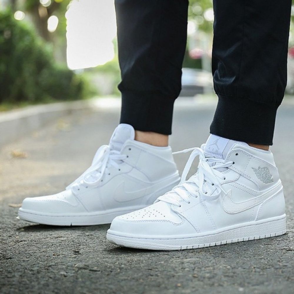 Air Jordan 1 Retro Mid in White Pure Platinum - product image from the listing.