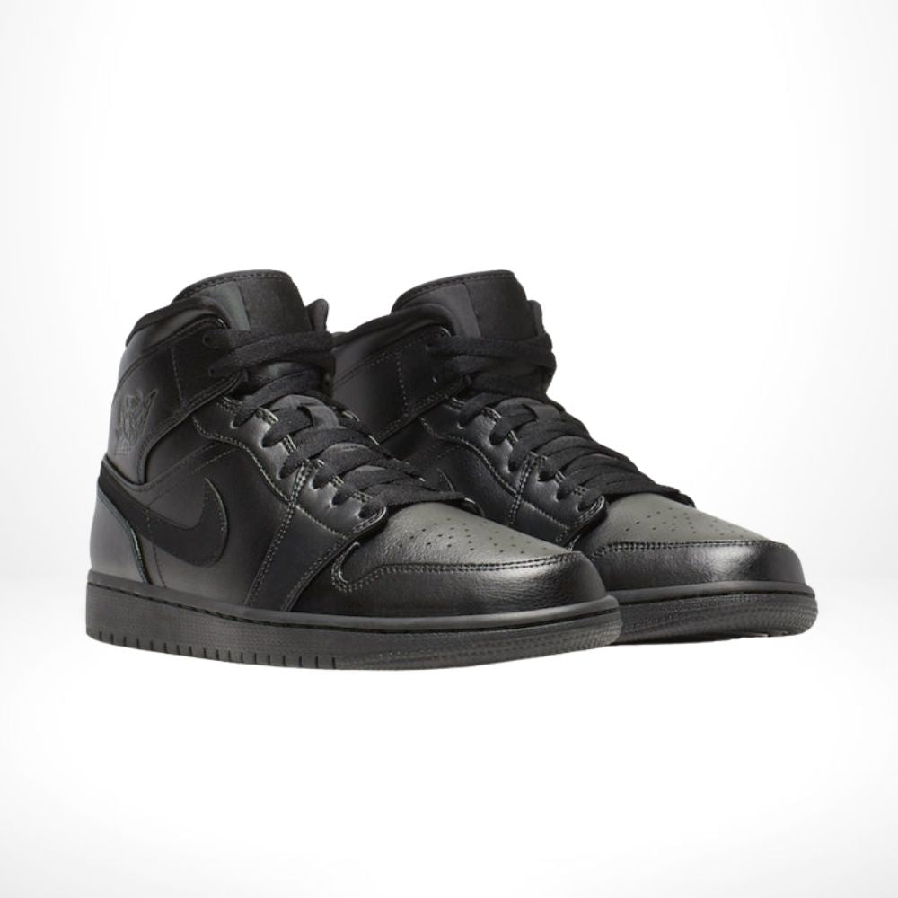 Air Jordan 1 Mid Triple in Black - product image from the listing.