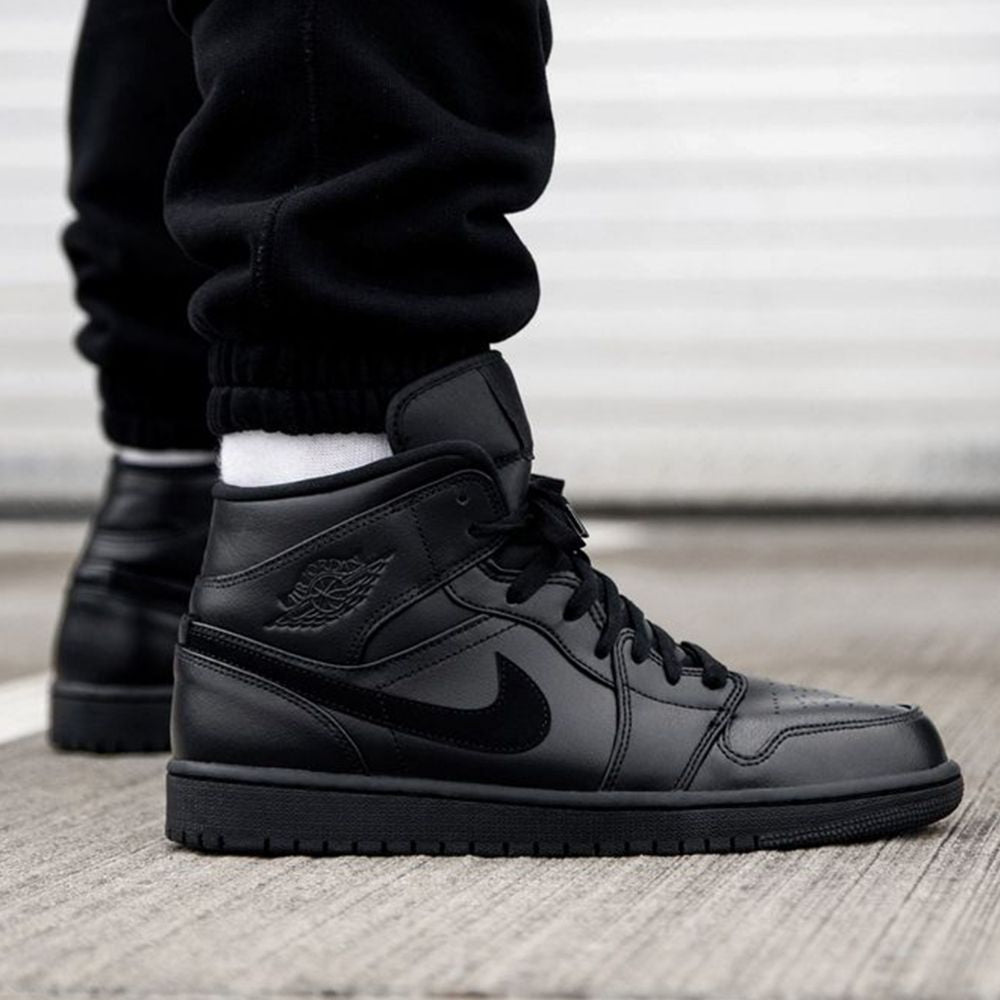 Air Jordan 1 Mid Triple in Black - product image from the listing.