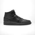 Air Jordan 1 Mid Triple in Black - product image from the listing.
