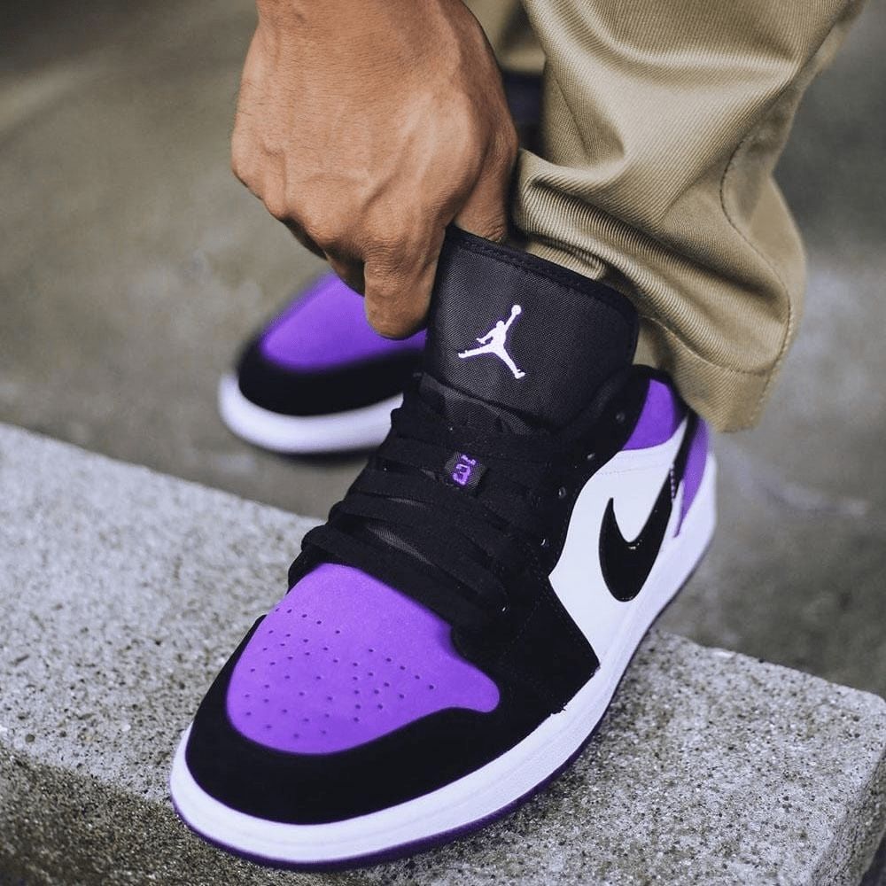 Air Jordan 1 Low Court in Purple Black - product image from the listing.