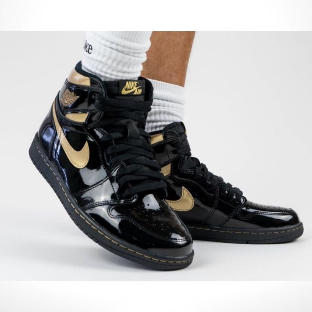 Air Jordan 1 Retro High OG in Black Metallic Gold - product image from the listing.