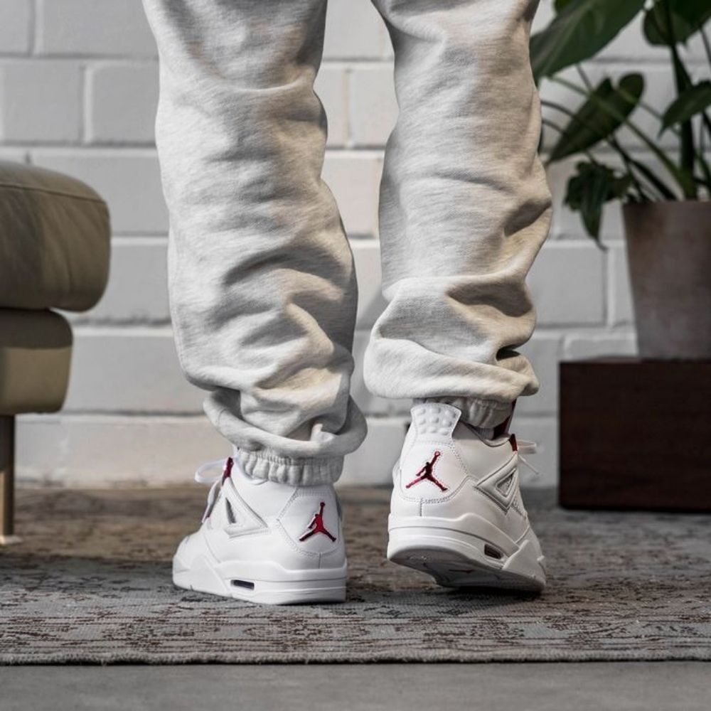 Air Jordan 4 Metallic Pack in White Red - product image from the listing.