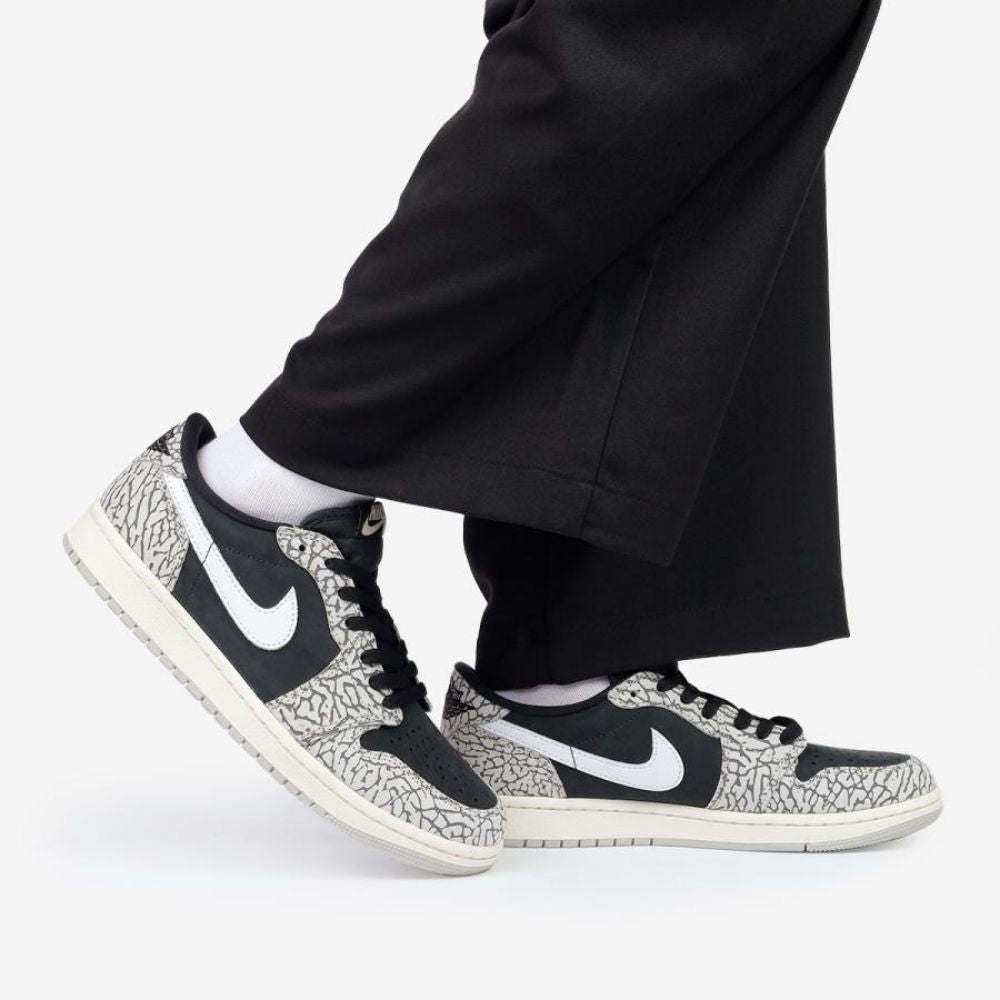 Black Cement - Air Jordan 1 Retro Low OG - product image from the listing.