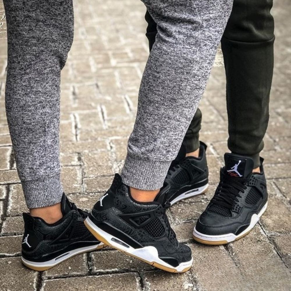 Air Jordan 4 Retro Laser in Black - product image from the listing.