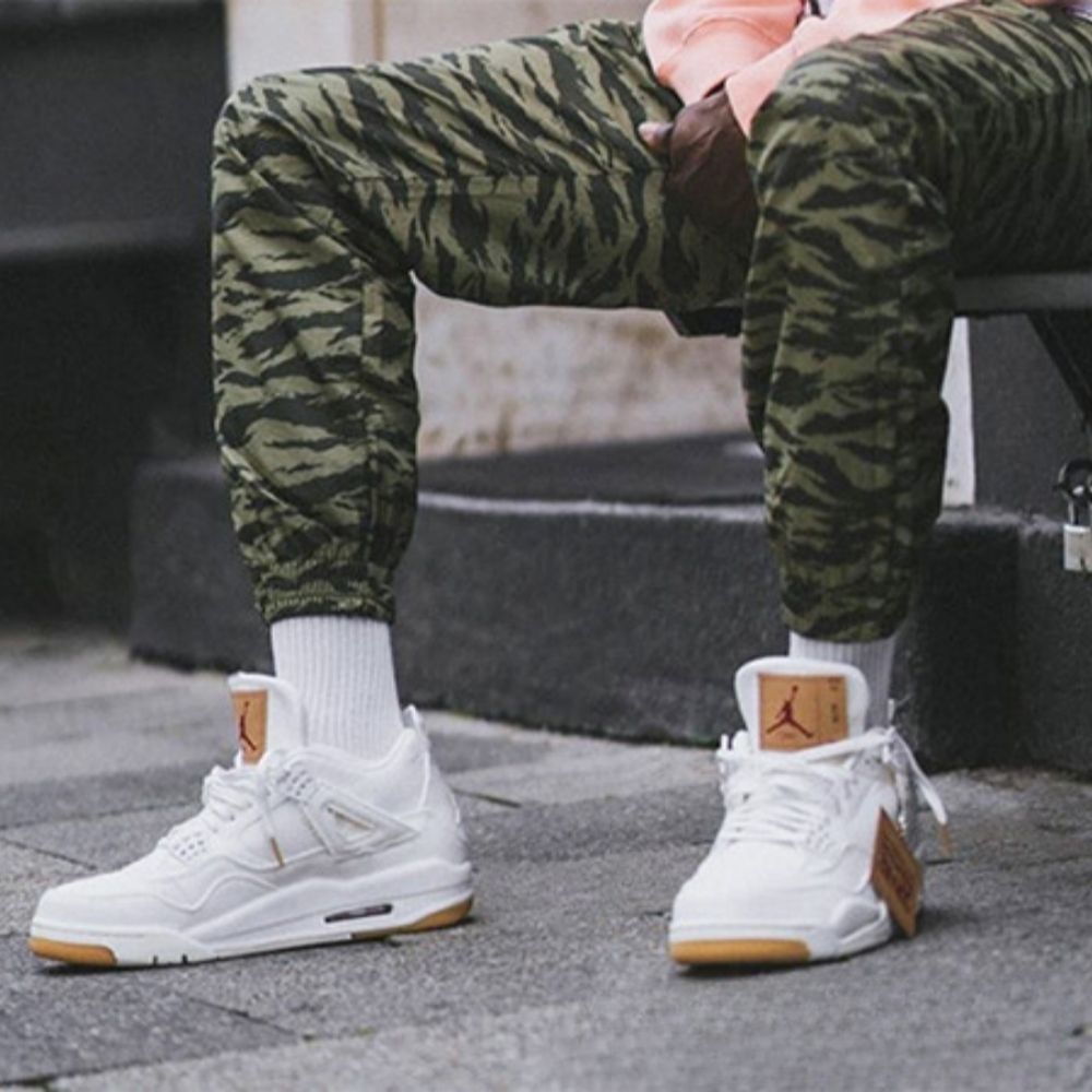 Air Jordan 4 Retro x Levis in White Denim - product image from the listing.