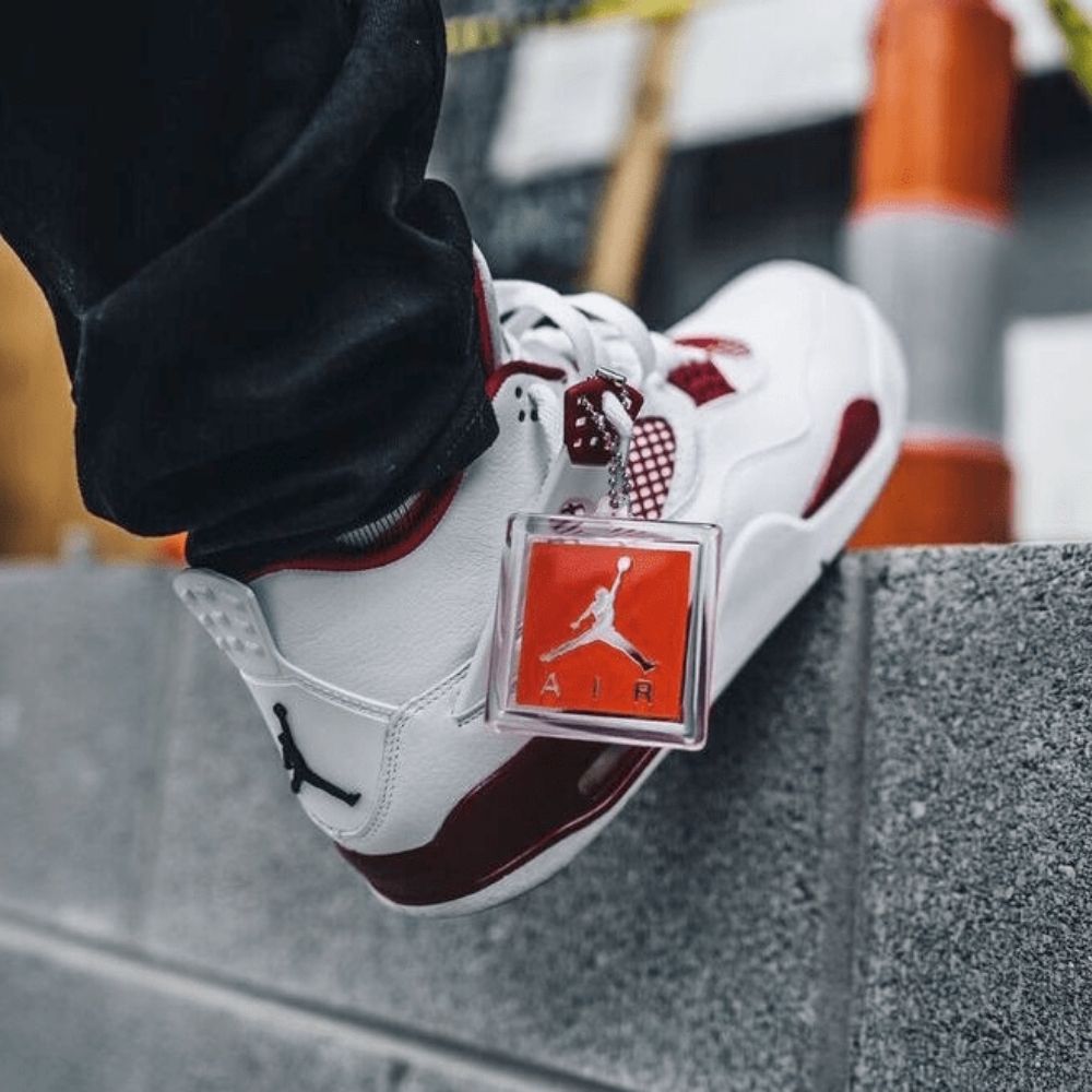 Air Jordan 4 Retro Alternate 89 in White Red - product image from the listing.