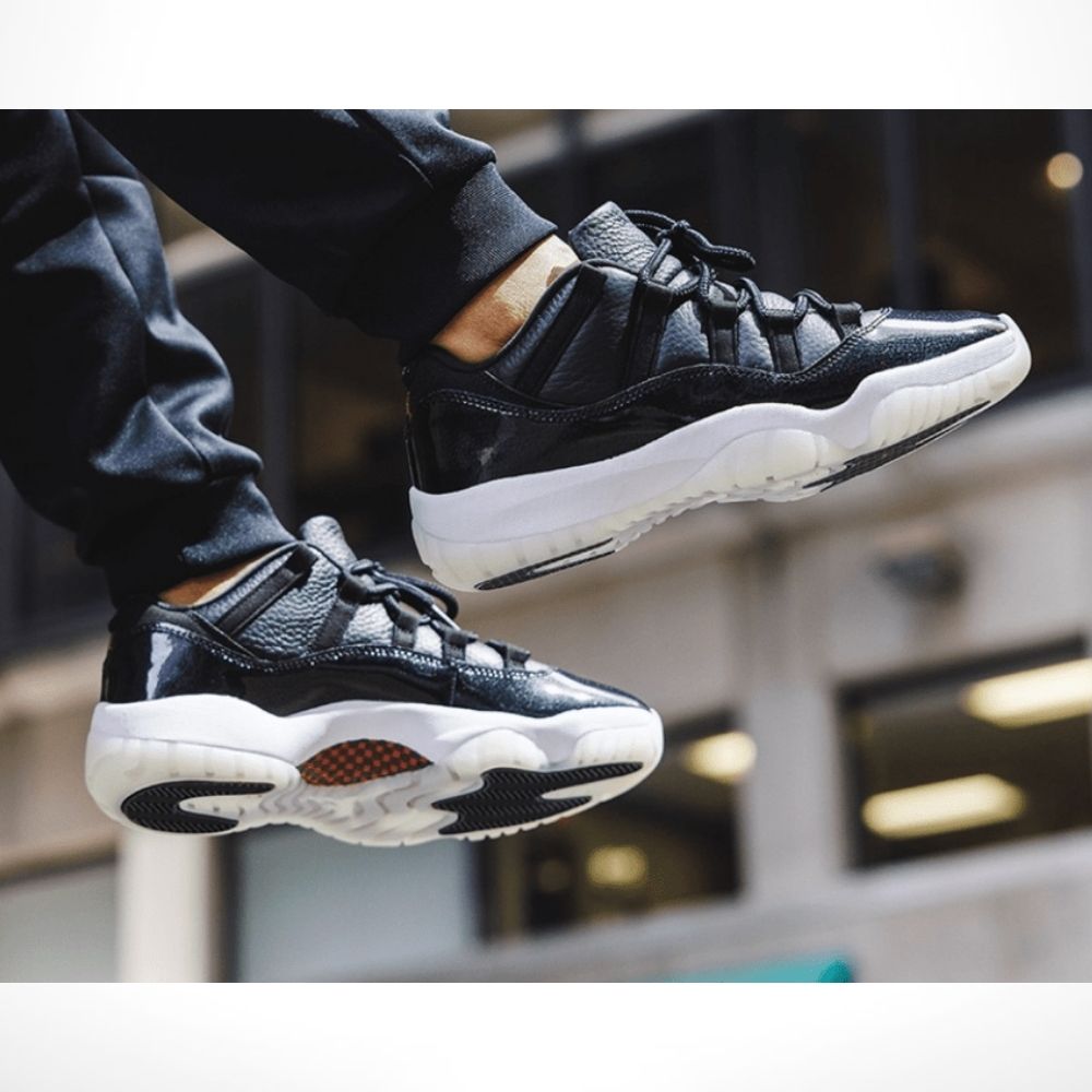 Air Jordan 11 Retro Low 72-10 in Black - product image from the listing.