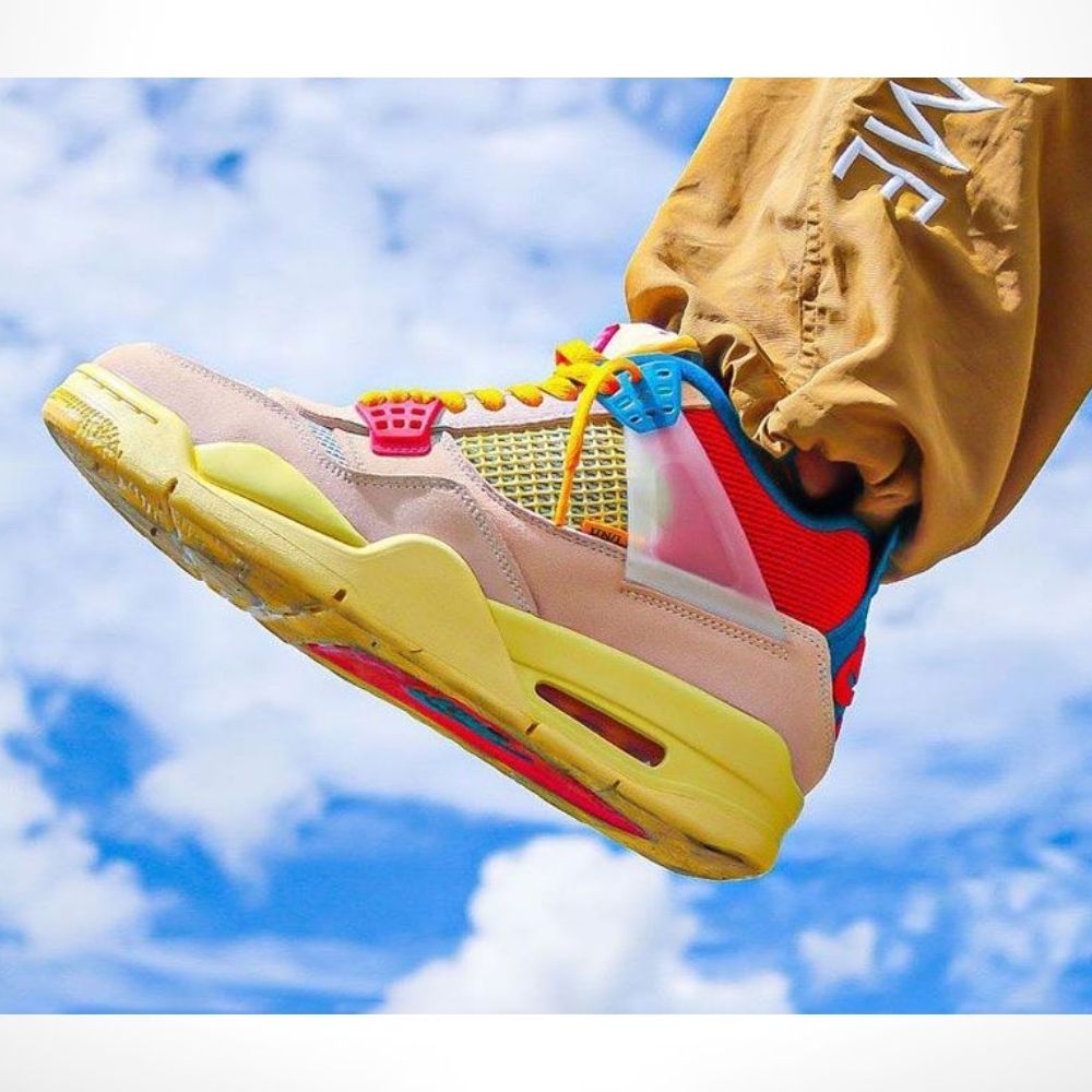 Air Jordan 4 Retro x Nike Air Union LA Guava in Ice Pink - product image from the listing.