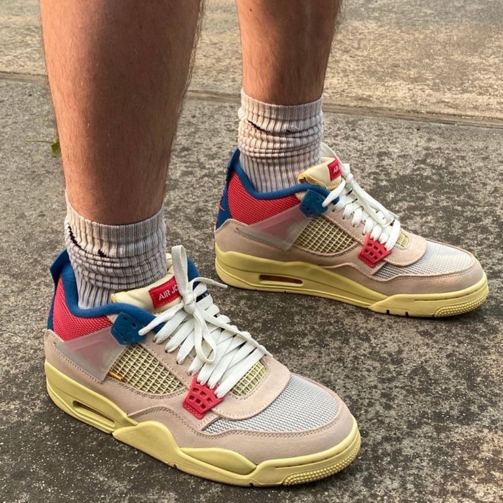 Air Jordan 4 Retro x Nike Air Union LA Guava in Ice Pink - product image from the listing.