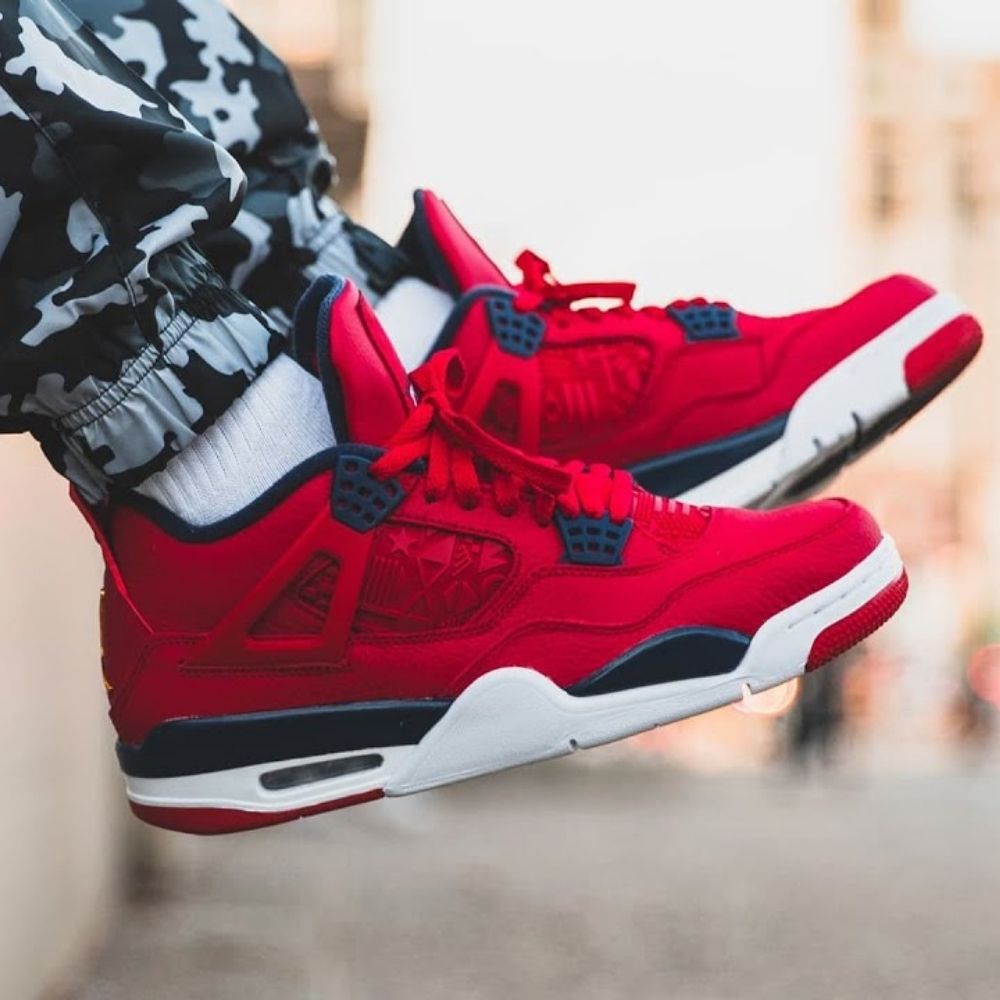Air Jordan 4 Retro FIBA in Red - product image from the listing.