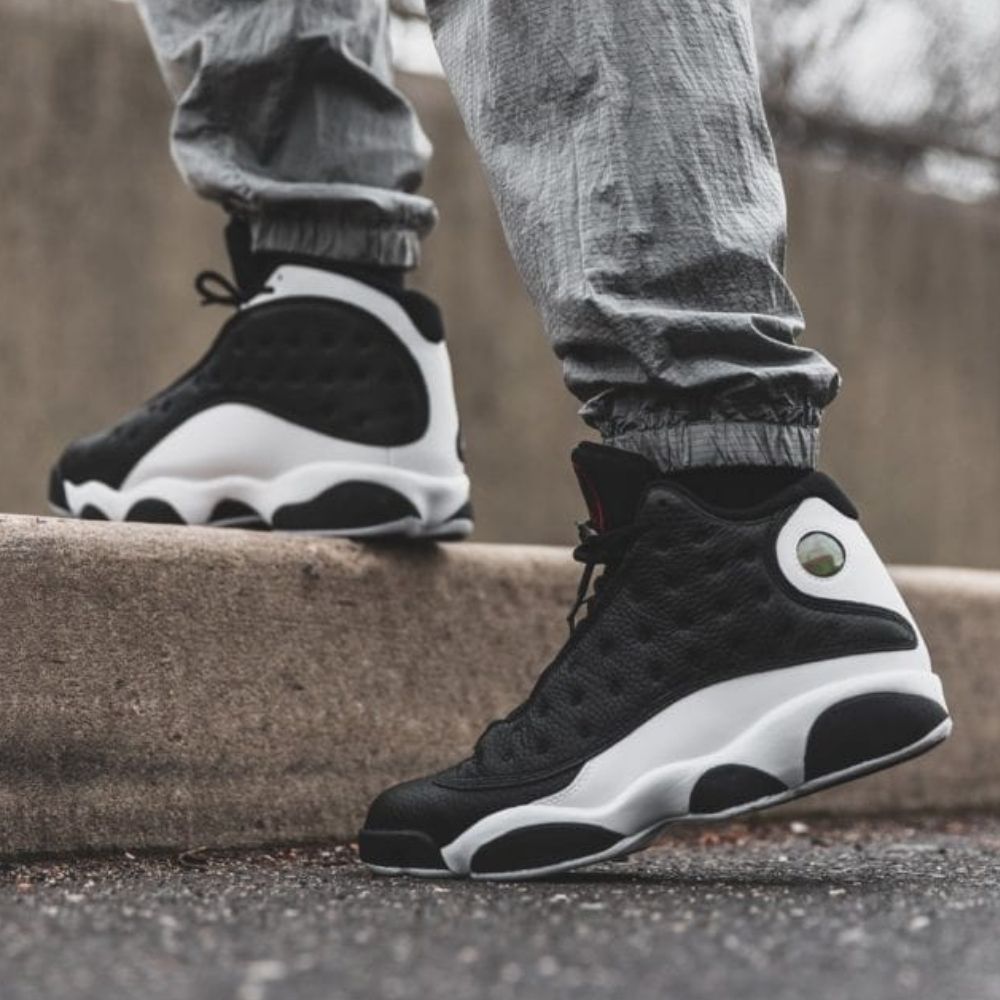 Air Jordan 13 Retro Reverse He Got Game in Black White - product image from the listing.