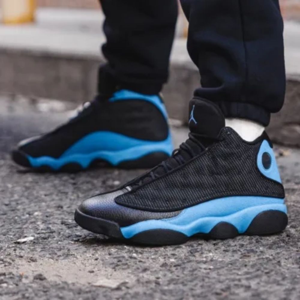 Air Jordan 13 Retro in Black University Blue - product image from the listing.