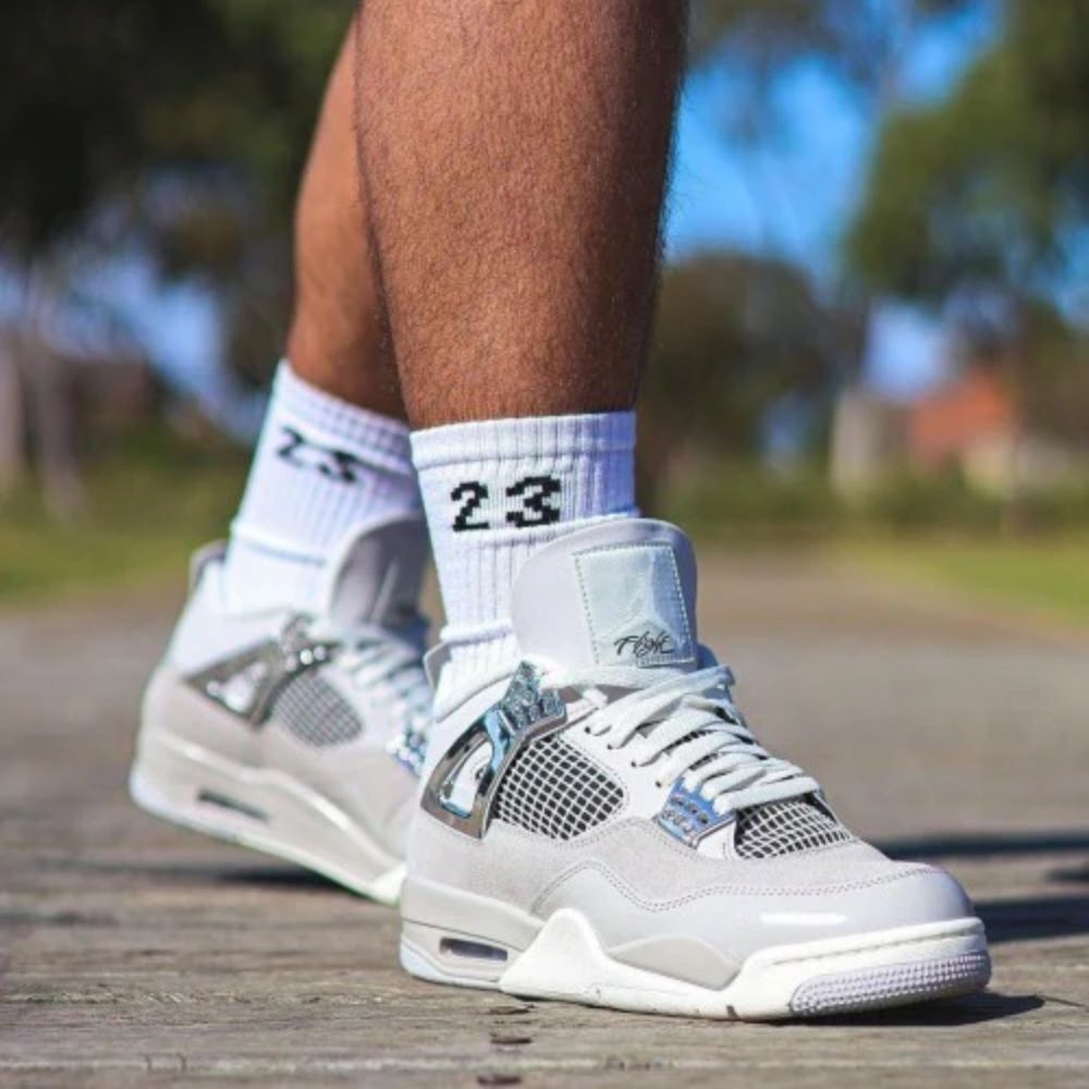 Frozen Moments - Air Jordan 4 Retro - product image from the listing.