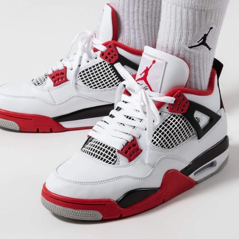 Fire Red - Air Jordan 4 Retro OG 2020 - product image from the listing.