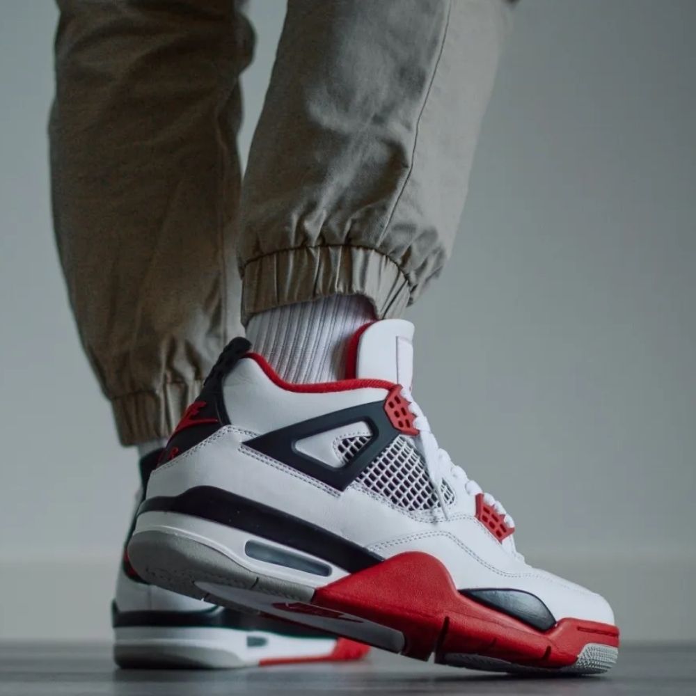 Fire Red - Air Jordan 4 Retro OG 2020 - product image from the listing.