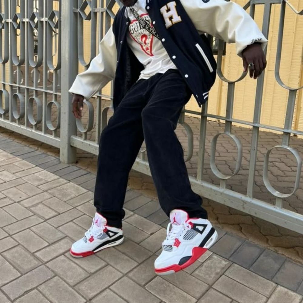 Fire Red - Air Jordan 4 Retro OG 2020 - product image from the listing.