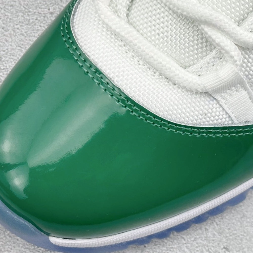 Air Jordan 11 Retro High in White And Green - product image from the listing.
