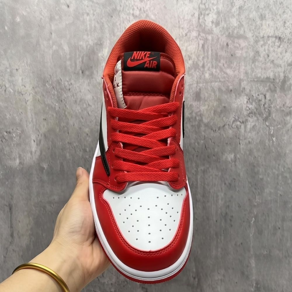 Air Jordan 1 Low x Travis Scott Chicago in Red - product image from the listing.