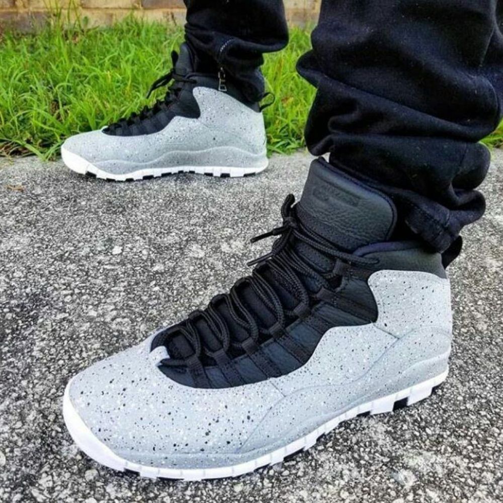 Air Jordan 10 Retro Cement in Black - product image from the listing.