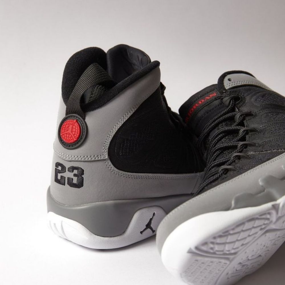 Air Jordan 9 Retro Particle in Grey - product image from the listing.
