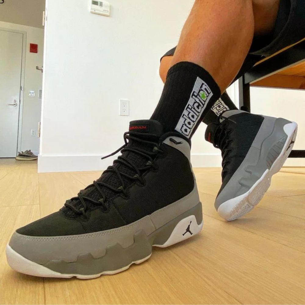 Air Jordan 9 Retro Particle in Grey - product image from the listing.