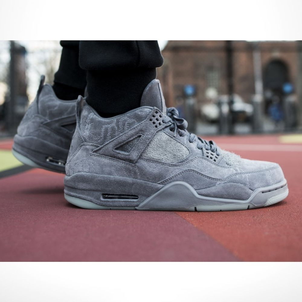 Air Jordan 4 Retro x KAWS in Cool Grey - product image from the listing.