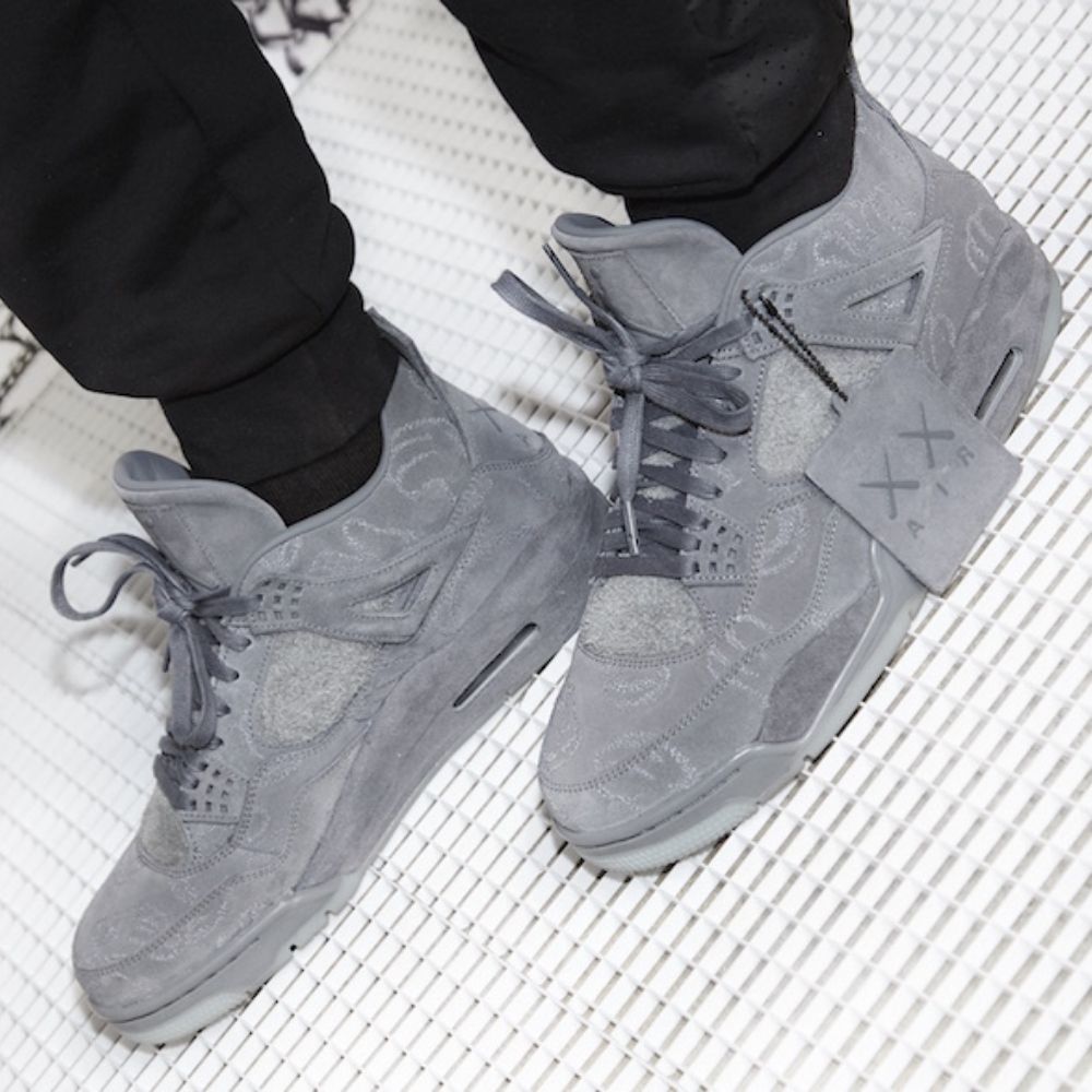 Air Jordan 4 Retro x KAWS in Cool Grey - product image from the listing.