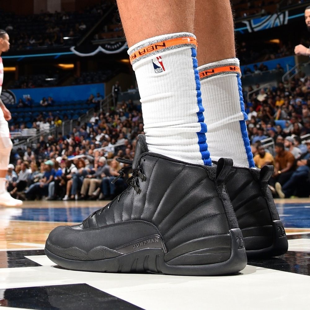 Air Jordan 12 Retro Winterized Triple in Black - product image from the listing.