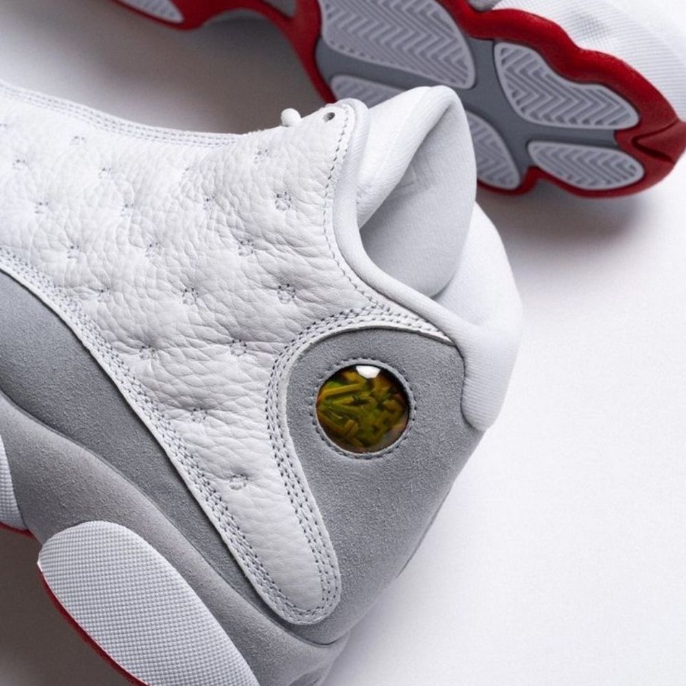 Air Jordan 13 Retro in White Wolf Grey - product image from the listing.