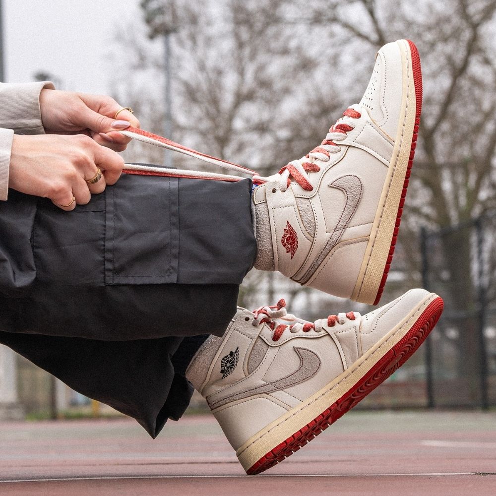 Air Jordan 1 Rare Air Cinnaba in Sail Light Bone - product image from the listing.