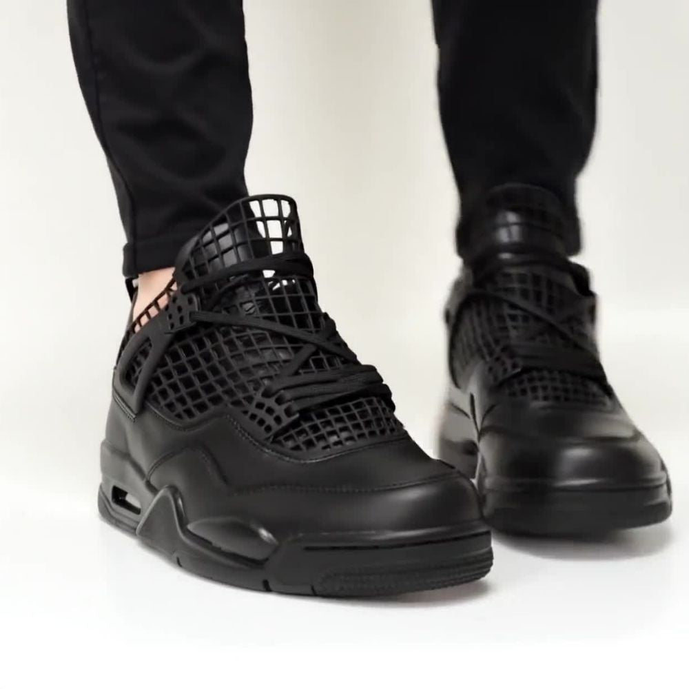 Air Jordan 4 Retro Net in Black - product image from the listing.