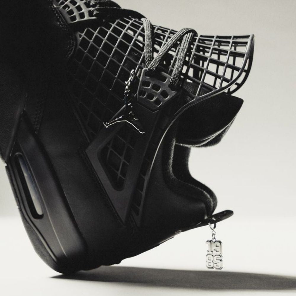 Air Jordan 4 Retro Net in Black - product image from the listing.