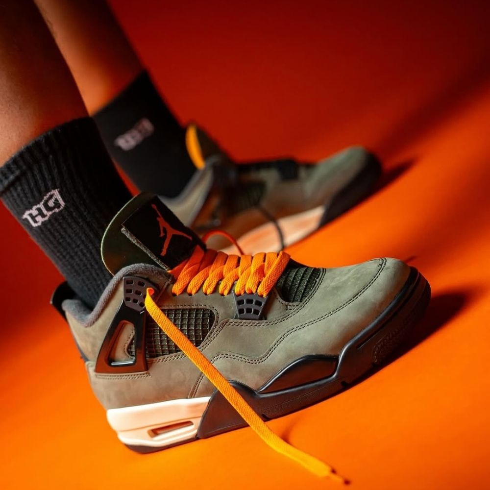x Undefeated OG Deep Green - Air Jordan 4 2025 - product image from the listing.