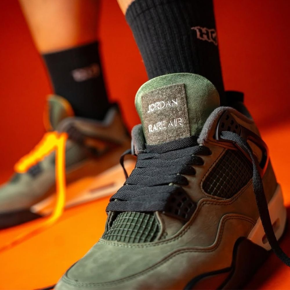 x Undefeated OG Deep Green - Air Jordan 4 2025 - product image from the listing.