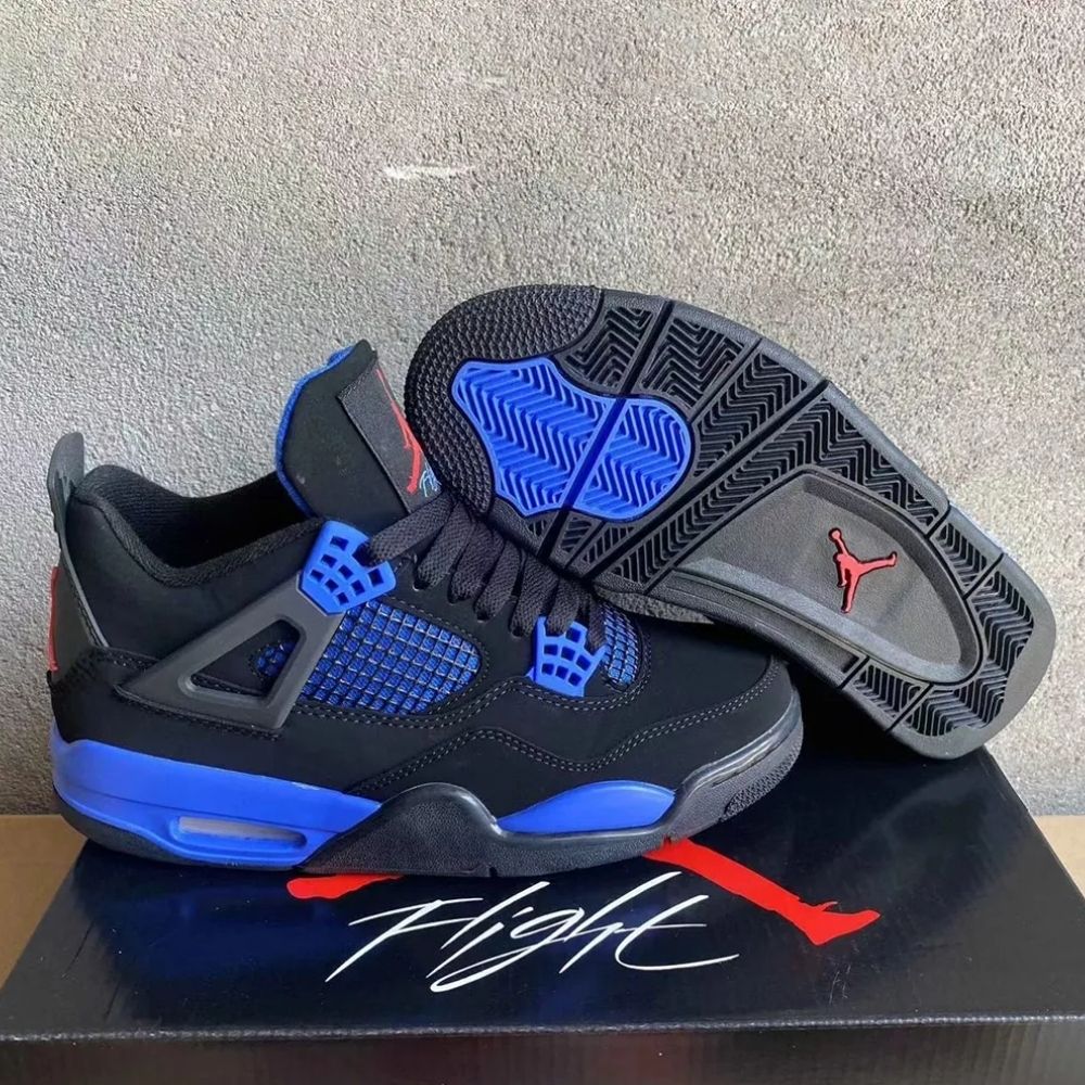 Air Jordan 4 in Black Deep Royal Blue - product image from the listing.