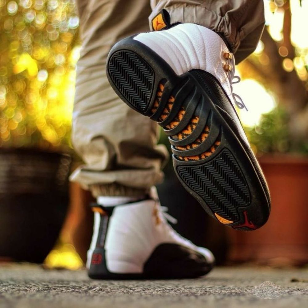 Taxi - Air Jordan 12 Retro 2025 - product image from the listing.