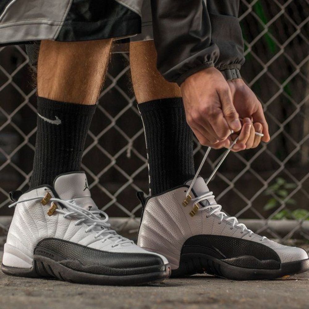 Taxi - Air Jordan 12 Retro 2025 - product image from the listing.