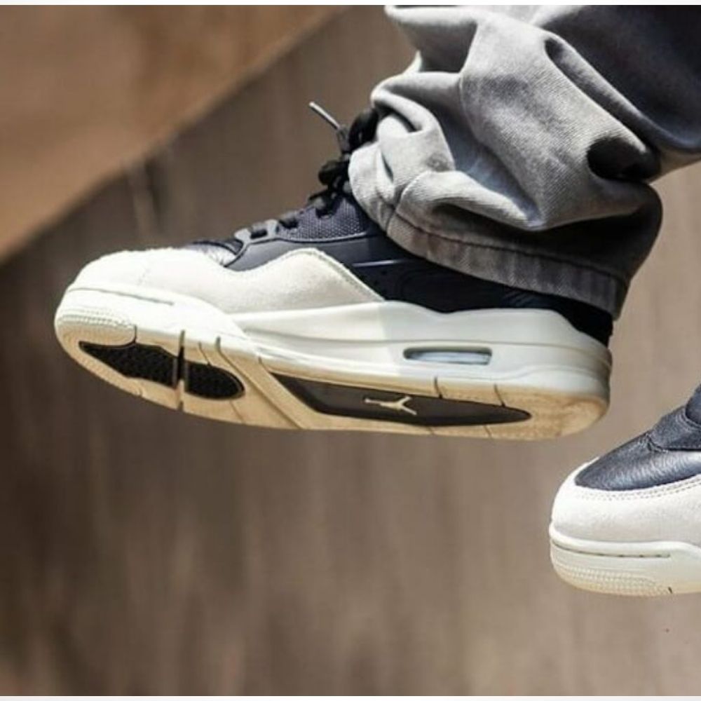 Air Jordan 4 x Nigel Sylvester RM in Black Light Bone - product image from the listing.