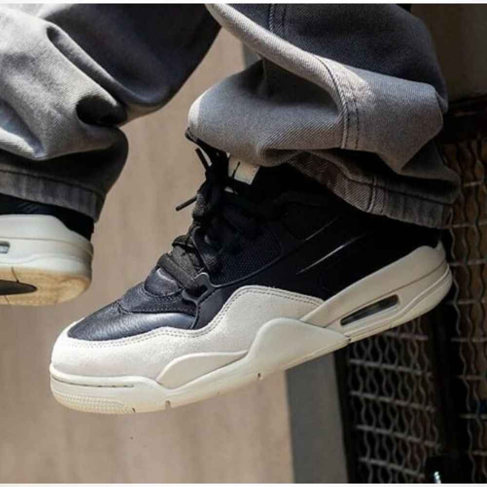 Air Jordan 4 x Nigel Sylvester RM in Black Light Bone - product image from the listing.