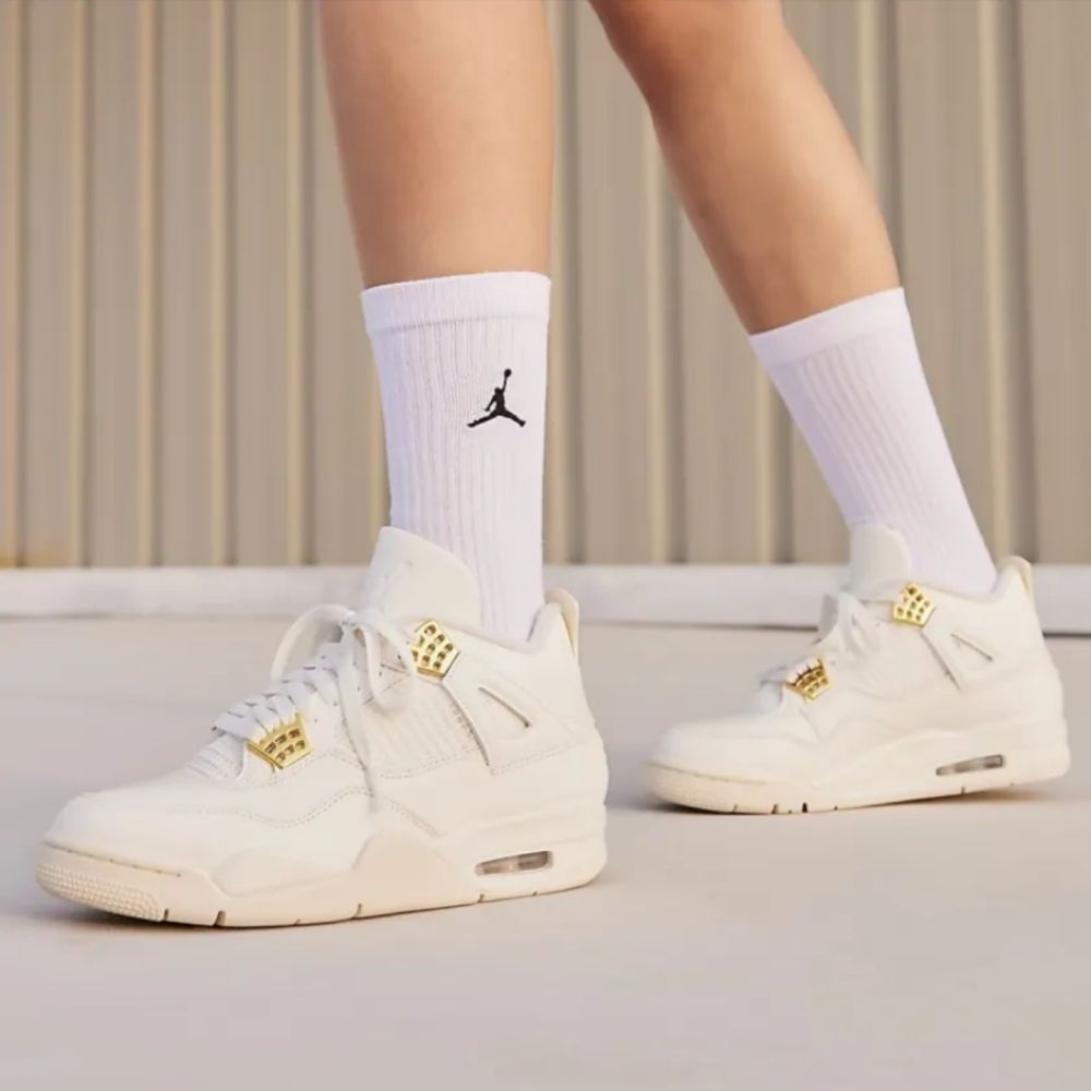 Air Jordan 4 in Sail Metallic Gold - product image from the listing.