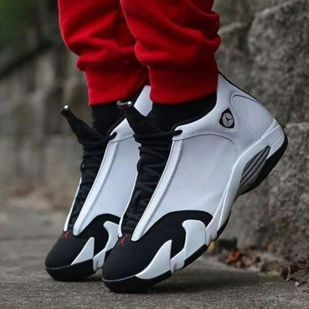 Air Jordan 14 OG Black Toe White Black Varsity in Red - product image from the listing.