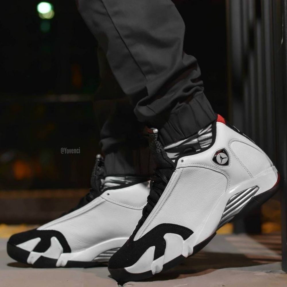 Air Jordan 14 OG Black Toe White Black Varsity in Red - product image from the listing.