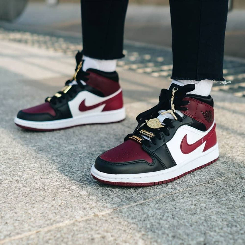 Black / Dark Beetroot (CZ4385-016) - Air Jordan 1 Mid SE Gold Pendants - product image from the listing.
